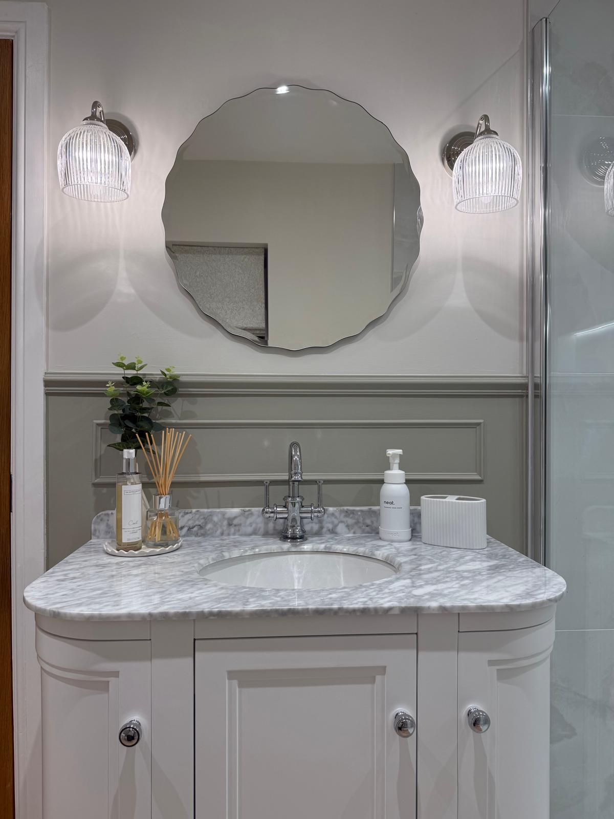 Traditional vanity and decorative mirror with wall lights